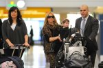 IMG/jpg/sarah-michelle-gellar-charlotte-lax-airport-march-4-2011-paparazzi-g (...)