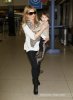 IMG/jpg/sarah-michelle-gellar-charlotte-lax-airport-paparazzi-april-4-2011-h (...)