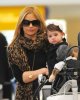 IMG/jpg/sarah-michelle-gellar-charlotte-lax-airport-march-4-2011-paparazzi-g (...)